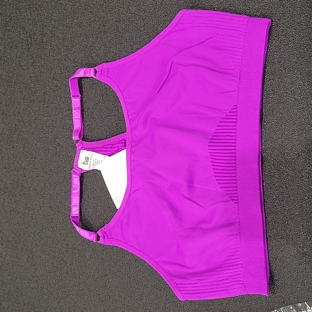 NWT Fabletics Samantha sports bra, size M. Purple. Racerback style. Adjustable.